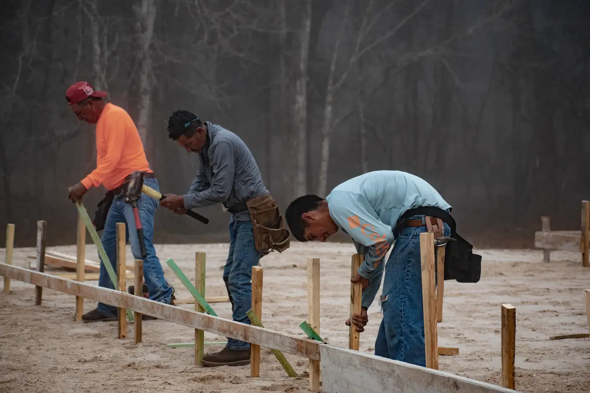 Total Concrete Services crew preparing a large residential site for concrete work